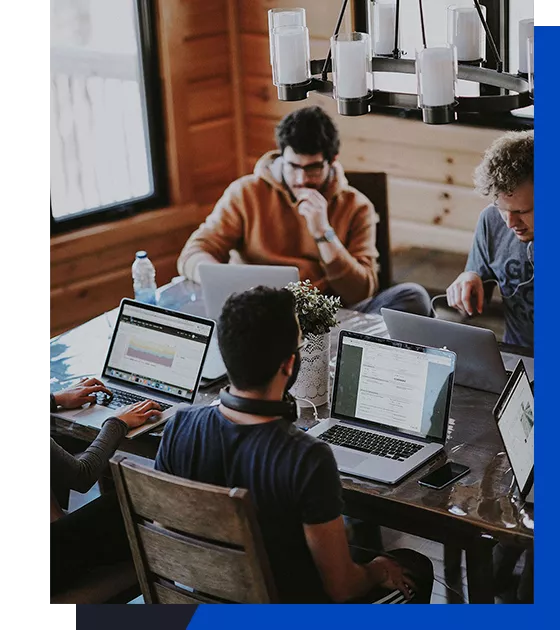 Young men working in a shared office